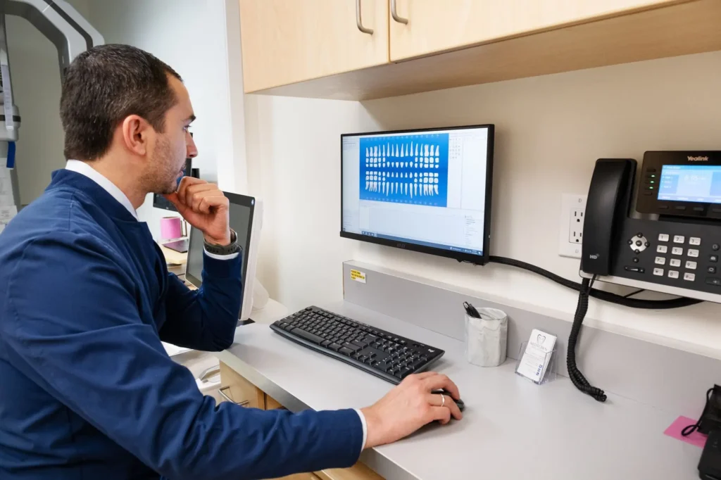 Dr. Castano Looking At Implant X-Ray